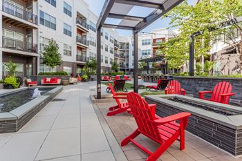 Sundeck with lounge seating, firepit & lawn games